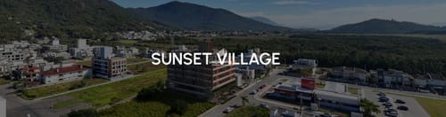 Logotipo do Sunset Village